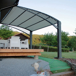 A wrought iron awning in a family house patio A wrought iron awning in a family house patio