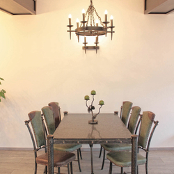 Historic interior design – Lightings, a luxury table and chairs, and a candle holder Historic interior design – Lightings, a luxury table and chairs, and a candle holder