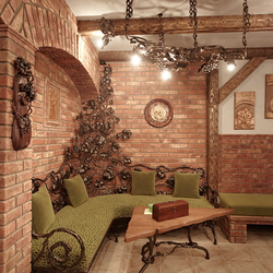 Amnagement complet et clairage de la cave à vin dans le style forg - mobilier de luxe et luminaires
