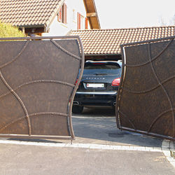 A wrought iron gate - privacy as art - A modern gate