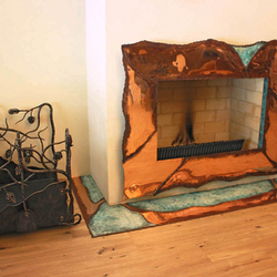 A copper wrought iron fireplace + a wrought iron firewood rack A copper wrought iron fireplace + a wrought iron firewood rack