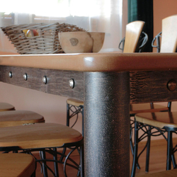  Hand-wrought iron dining table in a family house - a detail