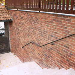 A wrought iron gate and railing