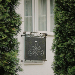 A modern railing with metal - a French window