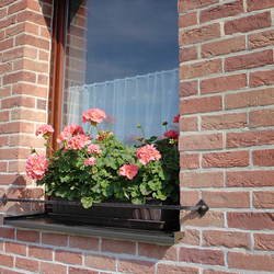 A wrought iron flowerpot