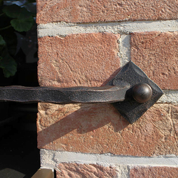 A wrought iron flowerpot - a detail A wrought iron flowerpot - a detail