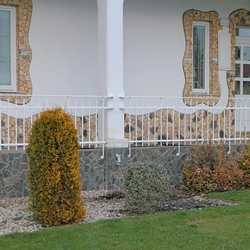 A wrought iron railing - a country house