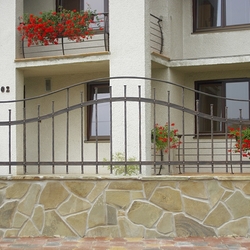 Balcony railings with forged solid flower pot holders Balcony railings with forged solid flower pot holders