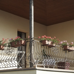 Forged family home balcony railing with flower pot holders Forged family home balcony railing with flower pot holders