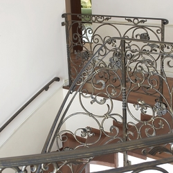 Forged staircase railing and handle in the interior of a family home – high quality railing Forged staircase railing and handle in the interior of a family home – high quality railing