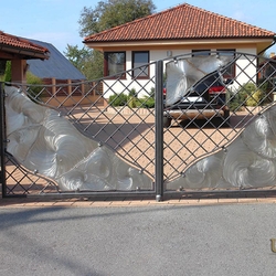 A modern wrought iron gate - stainless steel - iron combination
