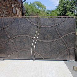 A wrought iron gate - privacy as art - An exclusive gate