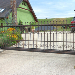 A wrought iron gate -  A sliding gate