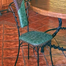 Le cuir de luxe sur une chaise en fer forgé