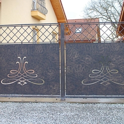 A wrought iron fence - A full gate