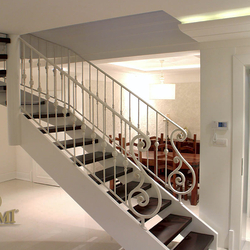 A wrought iron railing - ivory A wrought iron railing - ivory