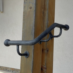 Wrought iron handrail on the external staircase of the Greek Catholic church in Slovakia Wrought iron handrail on the external staircase of the Greek Catholic church in Slovakia