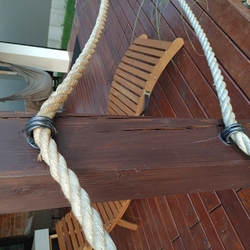 Forged rope brackets made by UKOVMI on a terrace railing Forged rope brackets made by UKOVMI on a terrace railing