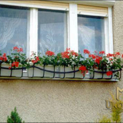 A wrought iron flower holder