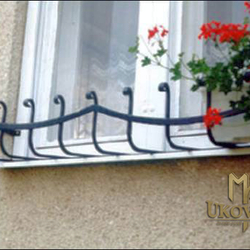 A wrought iron flower holder A wrought iron flower holder