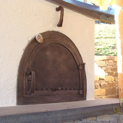 A wrought iron door for a clay stove A wrought iron door for a clay stove