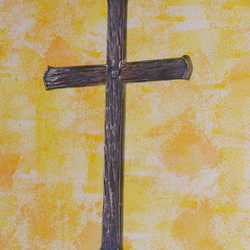 A wrought-iron wall cross