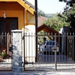 A wrought iron gate - a historic pattern replica - An exclusive gate
