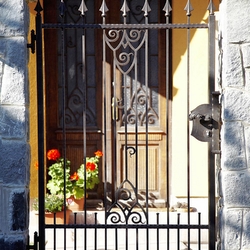 A wrought iron gate - a historic pattern replica