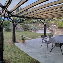 A luxury shelter with hand-forged trees created as an imitation of original living trees A luxury shelter with hand-forged trees created as an imitation of original living trees