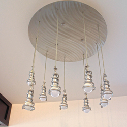 Suspension contemporaine en acier inoxydable  luminaire intrieur design.