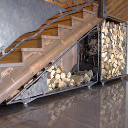 A special hand wrought iron firewood rack in a luxurious cottage A special hand wrought iron firewood rack in a luxurious cottage