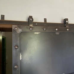 Portes coulissantes forges de style historique
