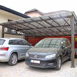 Wrought iron carport near the family house Wrought iron carport near the family house