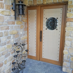 Forged wall light, candle holder, grilles, and door handle Forged wall light, candle holder, grilles, and door handle