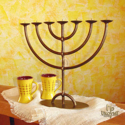 Forged Menorah candleholder with an oval base  religious candleholders