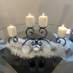 Create apleasant and peaceful atmosphere, using an Advent candle holder