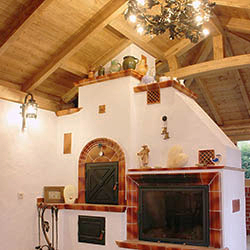 A closed gazebo with a summer kitchen